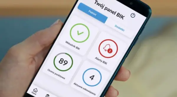 Panel BIK na smartfonie pokazuje wskaźnik BIK, ocenę punktową 89, alerty i aktywne zobowiązania. Sprawdź, jak długo w BIK po spłacie zadłużenia.