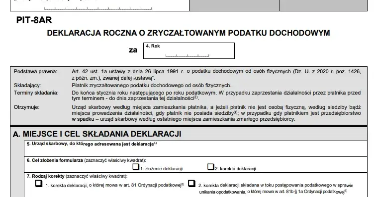 Polska deklaracja podatkowa PIT z kalkulatorem i długopisem